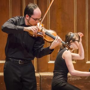 Violinist and pianist perform together