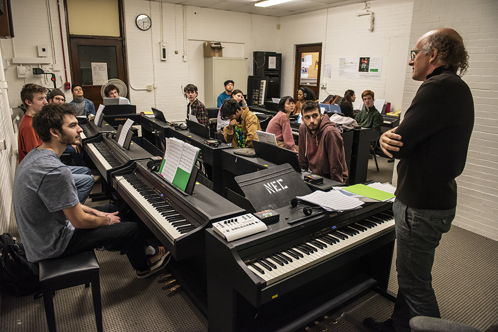 Students in a keyboard instruction room