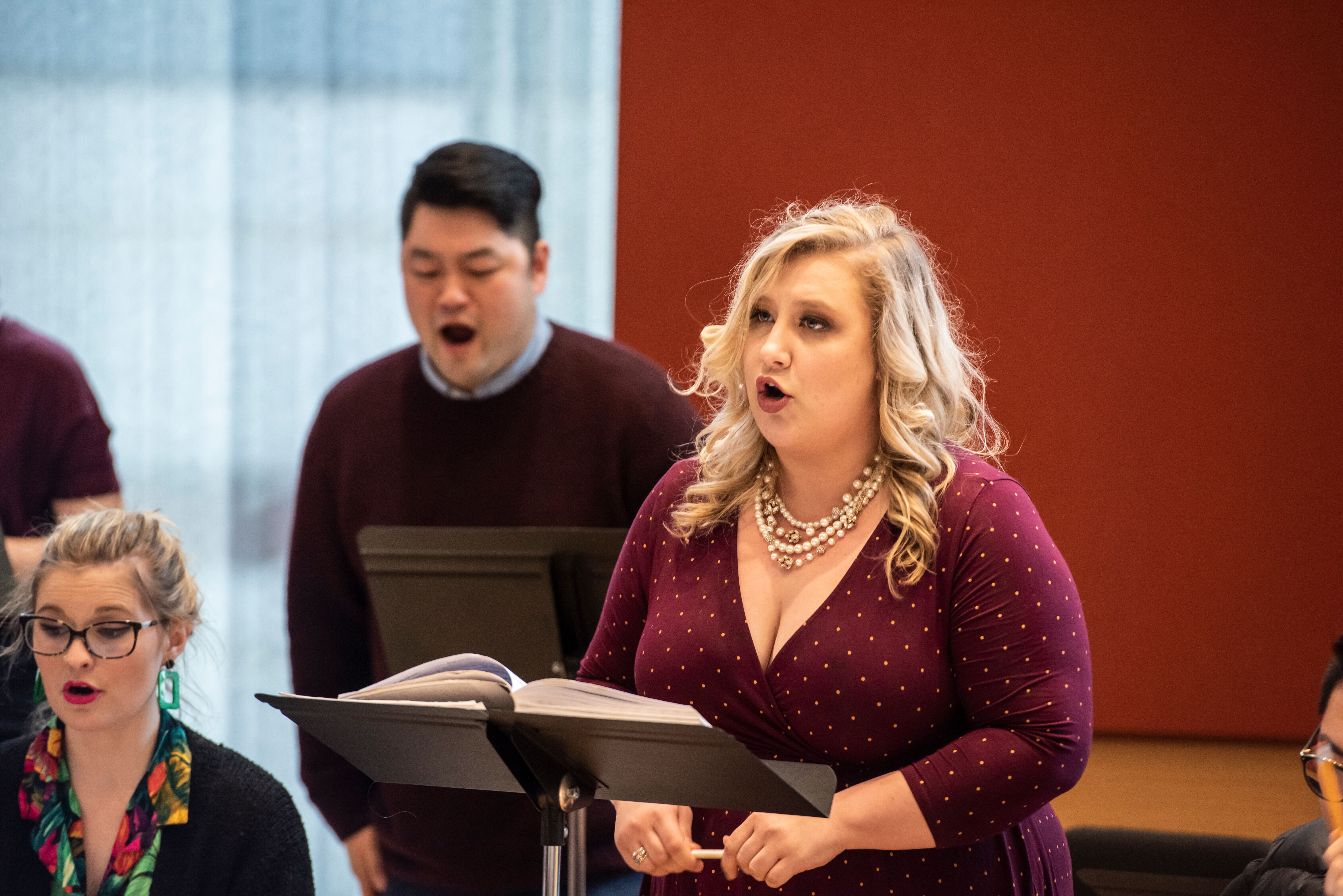Whitney Robinson singing in rehearsal for an opera