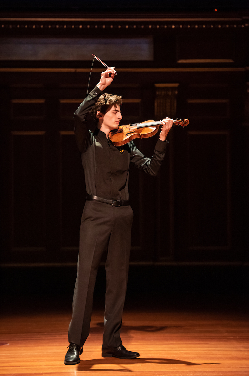 Joshua Brown plays the violin in Jordan Hall.