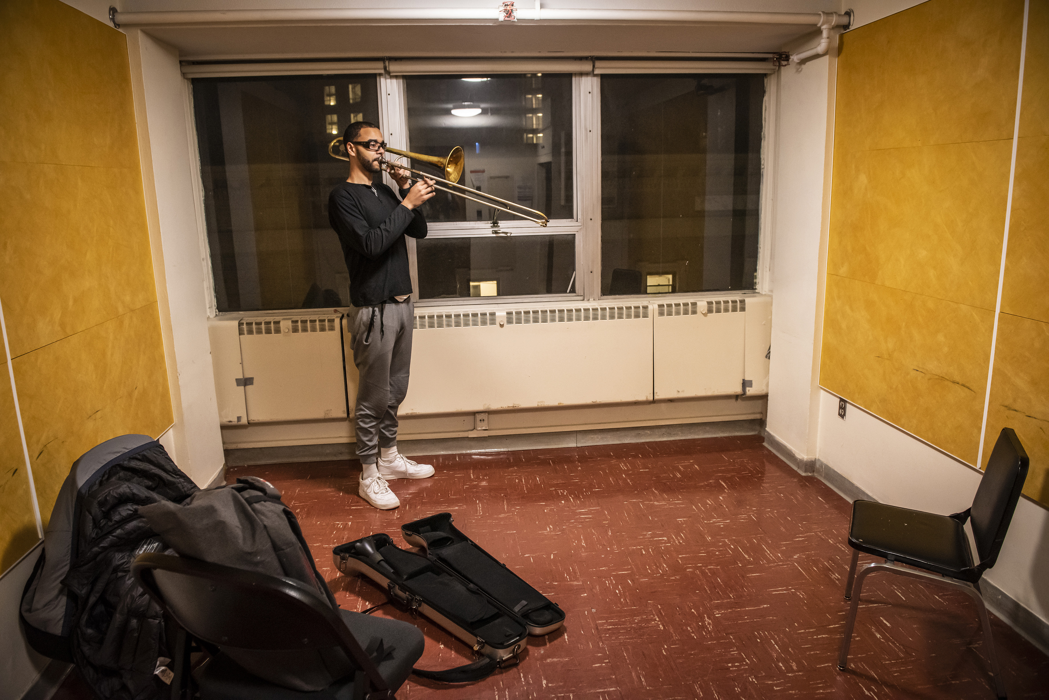 Trombonist Tyler Bonilla practices in the 33 Gainsborough building