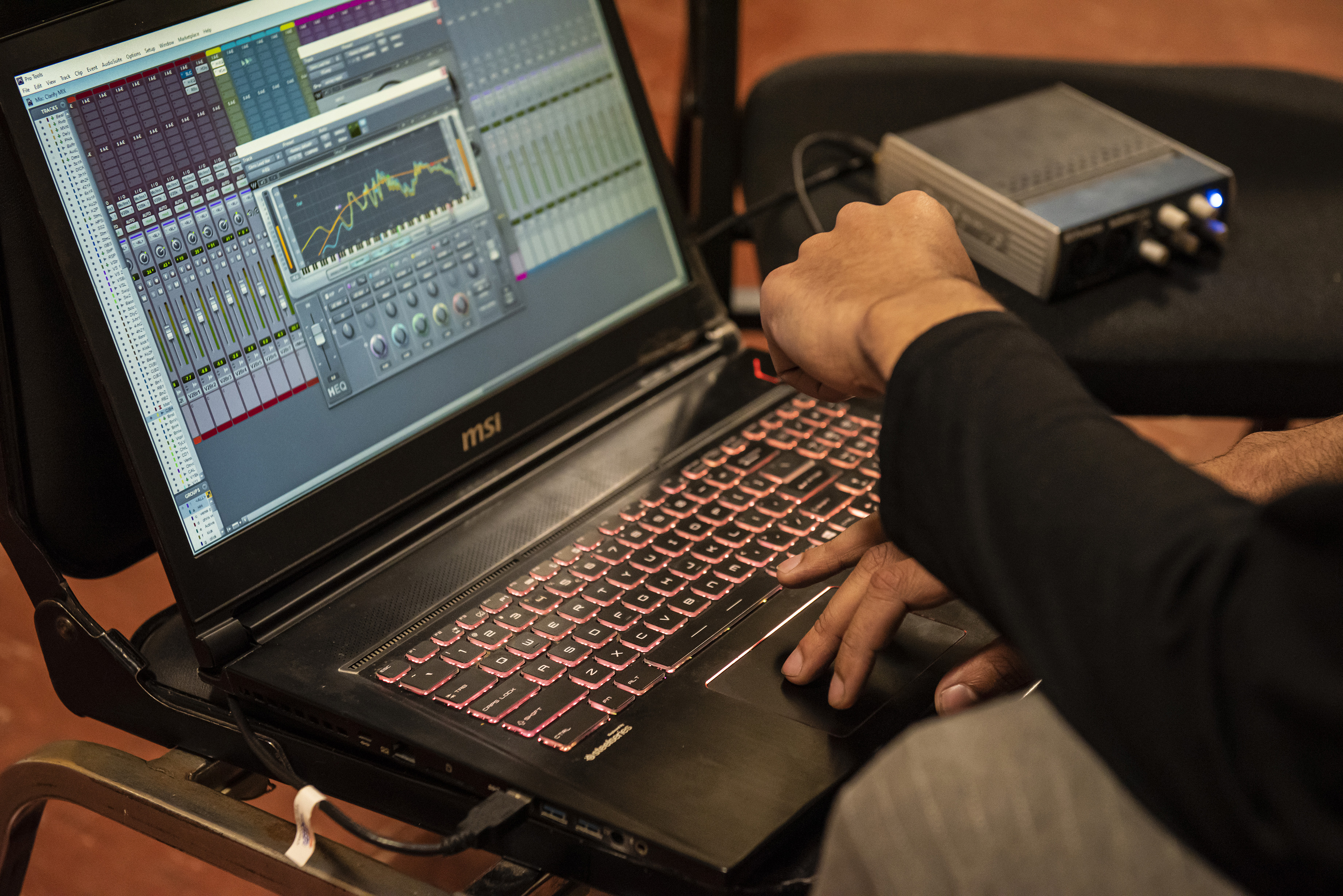 Audio mixing software on a laptop computer