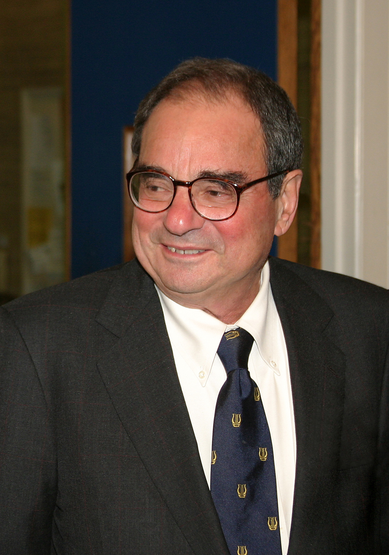 Portrait of Daniel Steiner, wearing suit and tie, looking to the left