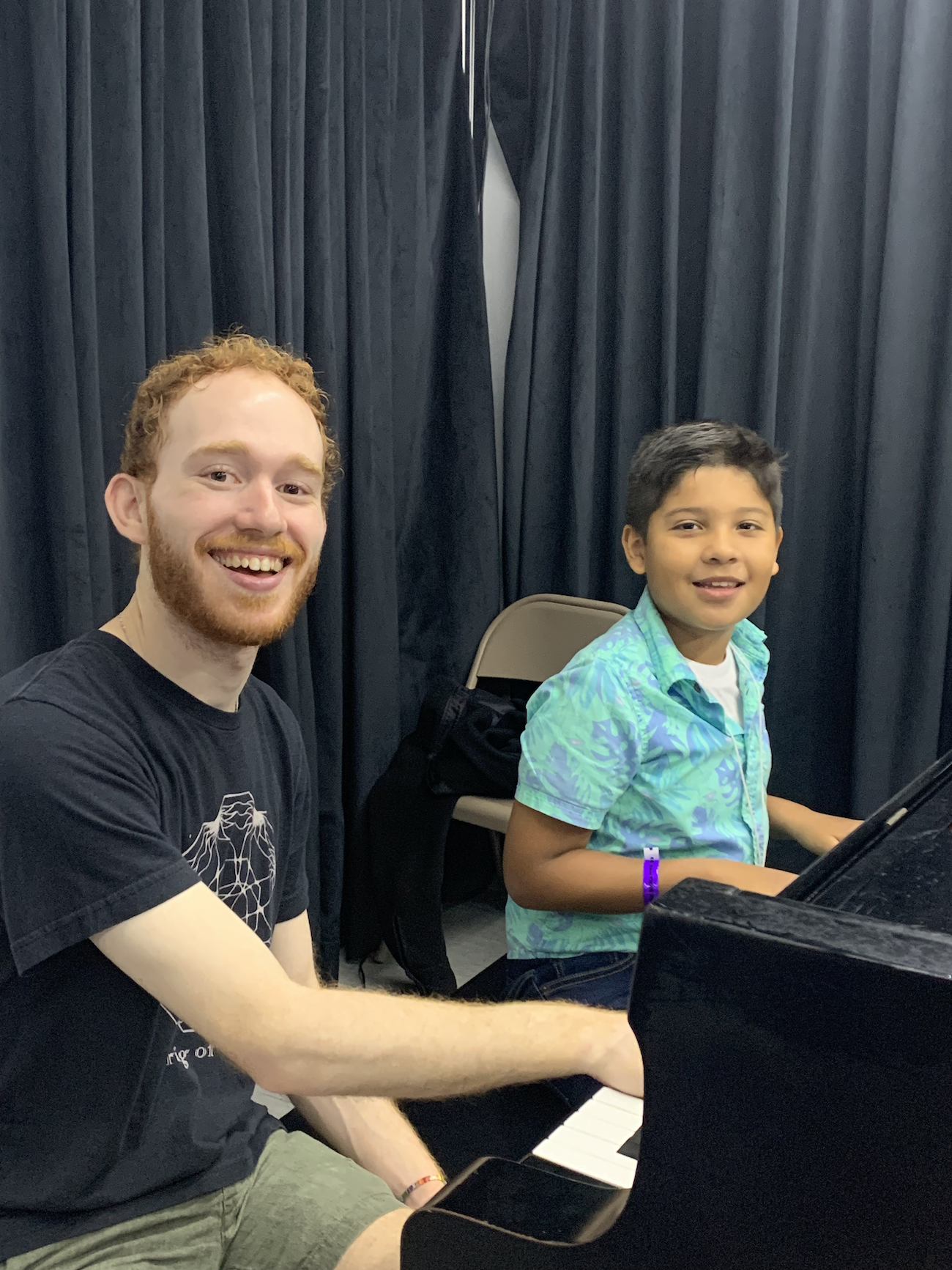 Andrew Barnwell ’20, ’23 MM, ’24 GD, pianist in Trio Gaia, teaches a student.