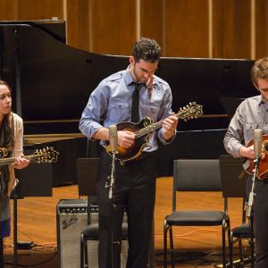 Three Contemporary Improvisation students play mandolin