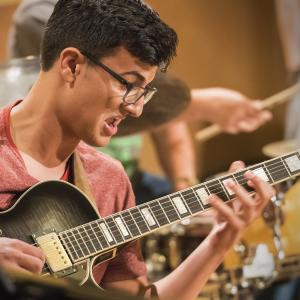 A guitarist from NEC Jazz Studies performs