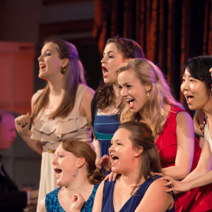 A group of female singers performing