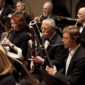 an image of the New England philharmonic in concert