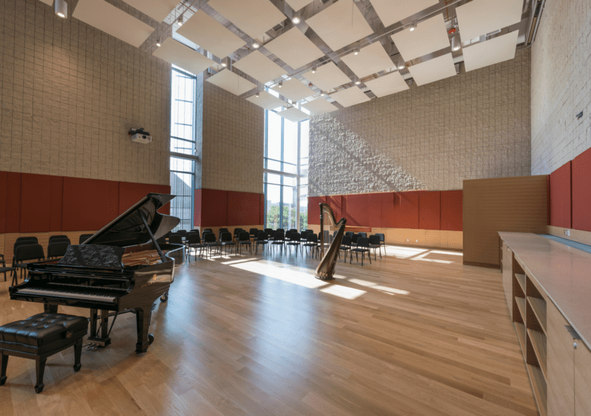 Burnes Hall empty with piano and harp