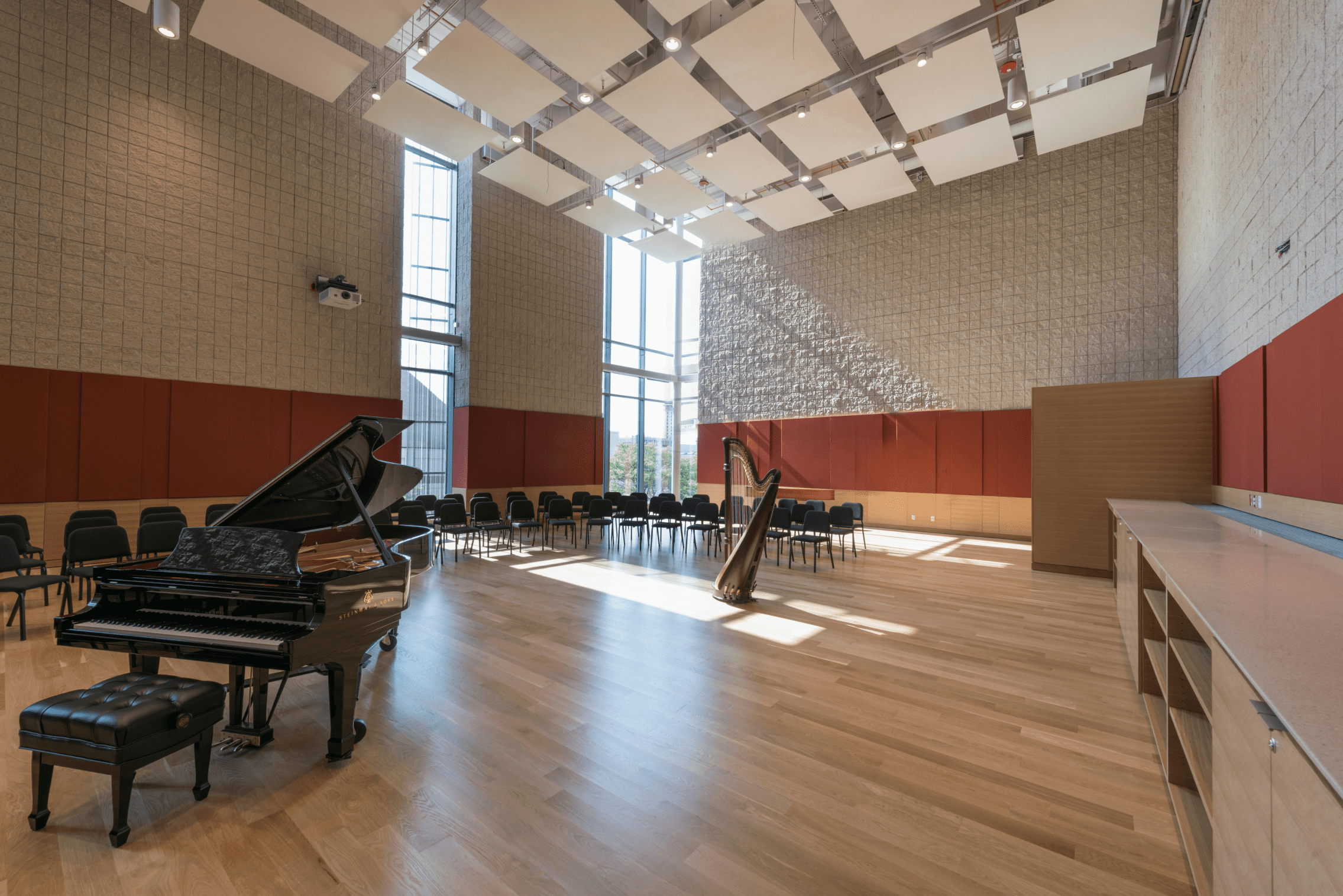 Burnes Hall empty with piano and harp