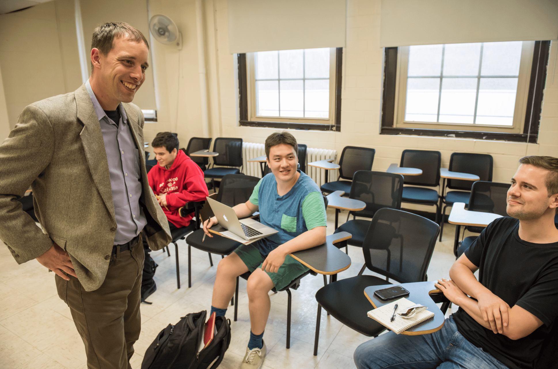 Matthew Duvanek in class with students