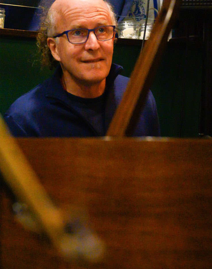 Bert Seager sitting at a piano.