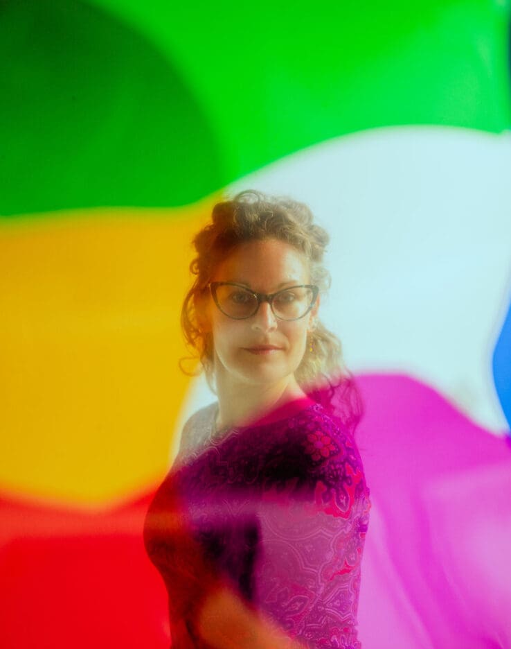 Headshot of Jessi Rosinski with a colorful overlay.