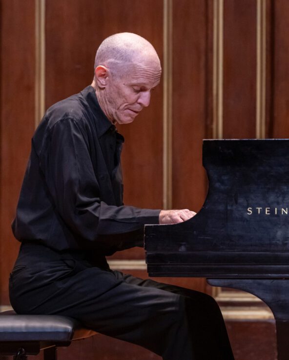 Stephen Drury playing piano.