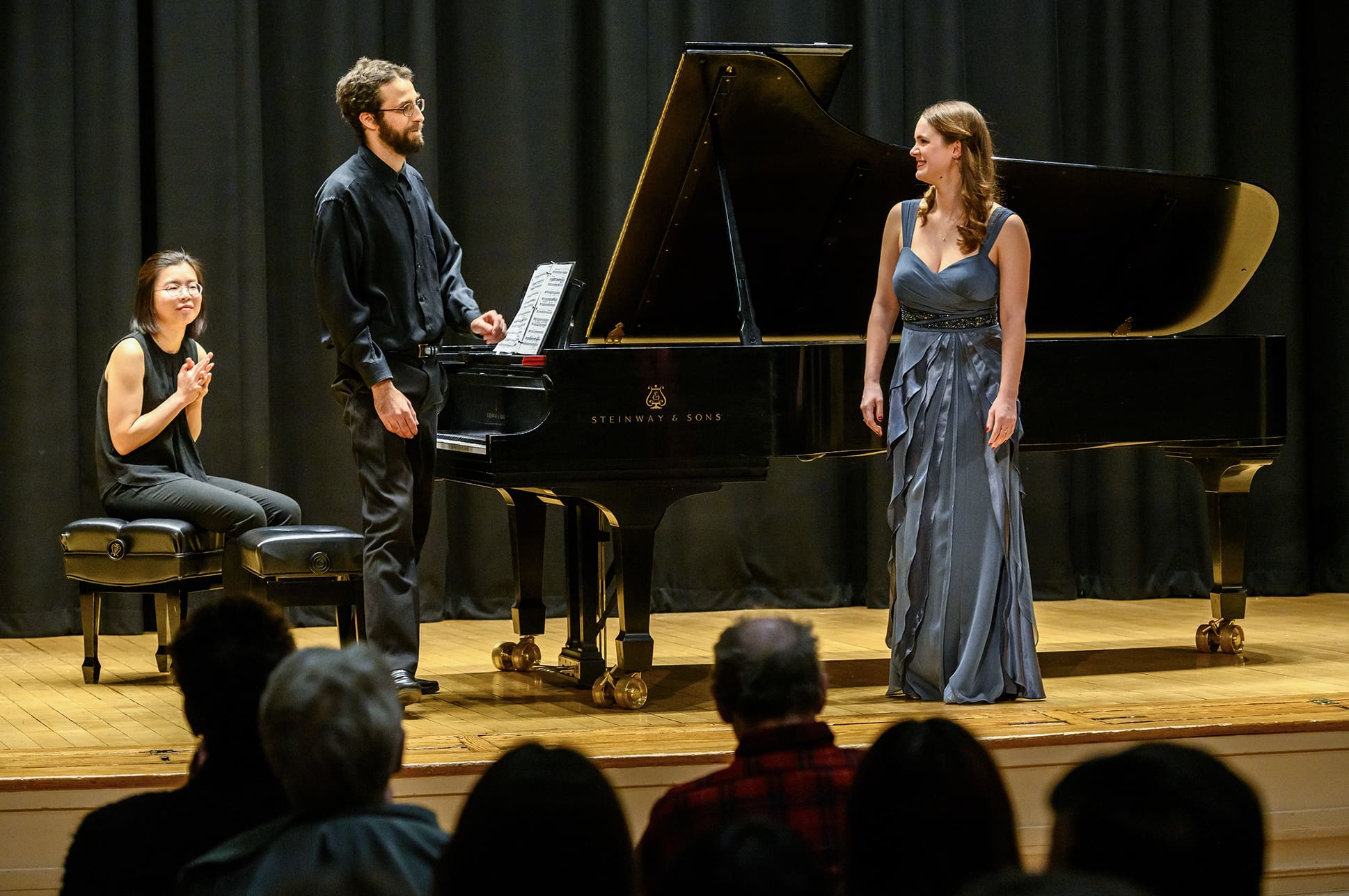 Soprano Emily Siar and pianist Elias Dagher bow after a performance in NEC's Williams Hall.
