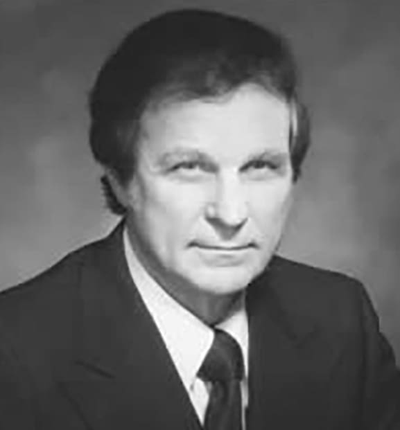 Portrait image of NEC President J. Stanley Ballinger