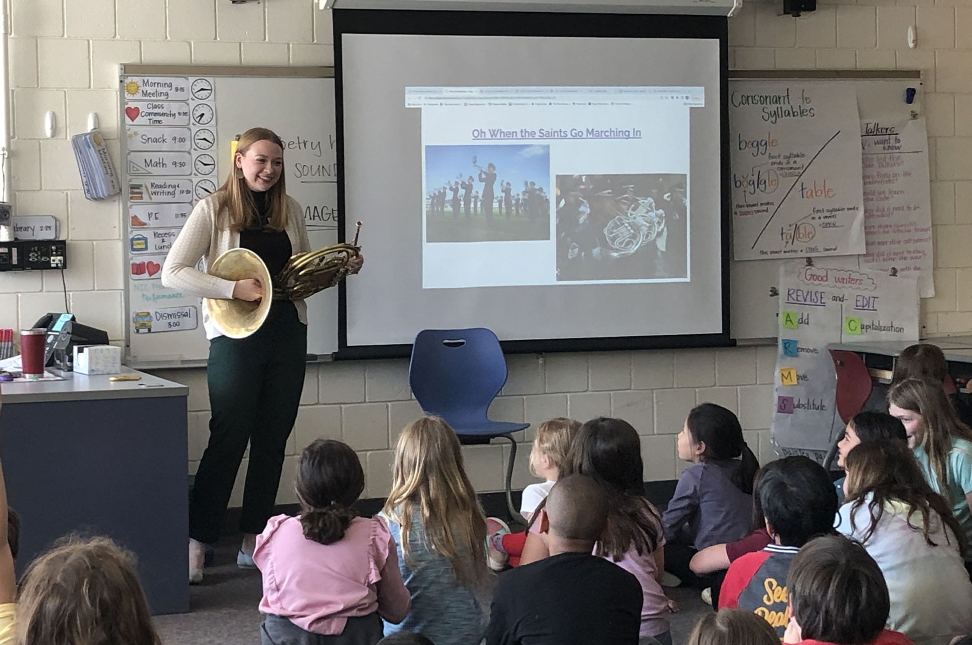 musician teaching young students