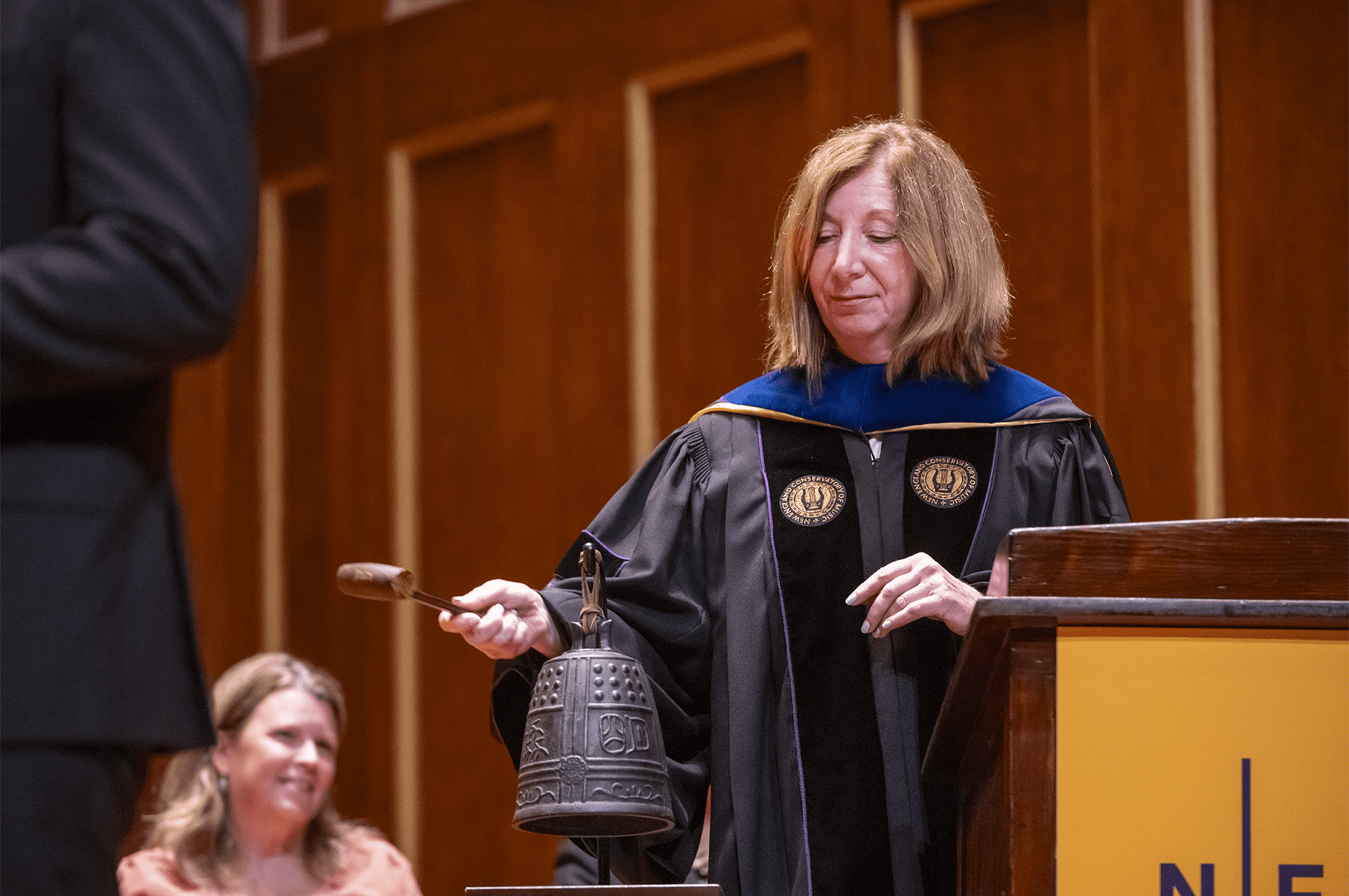 Andrea Kalyn rings the bell at Convocation
