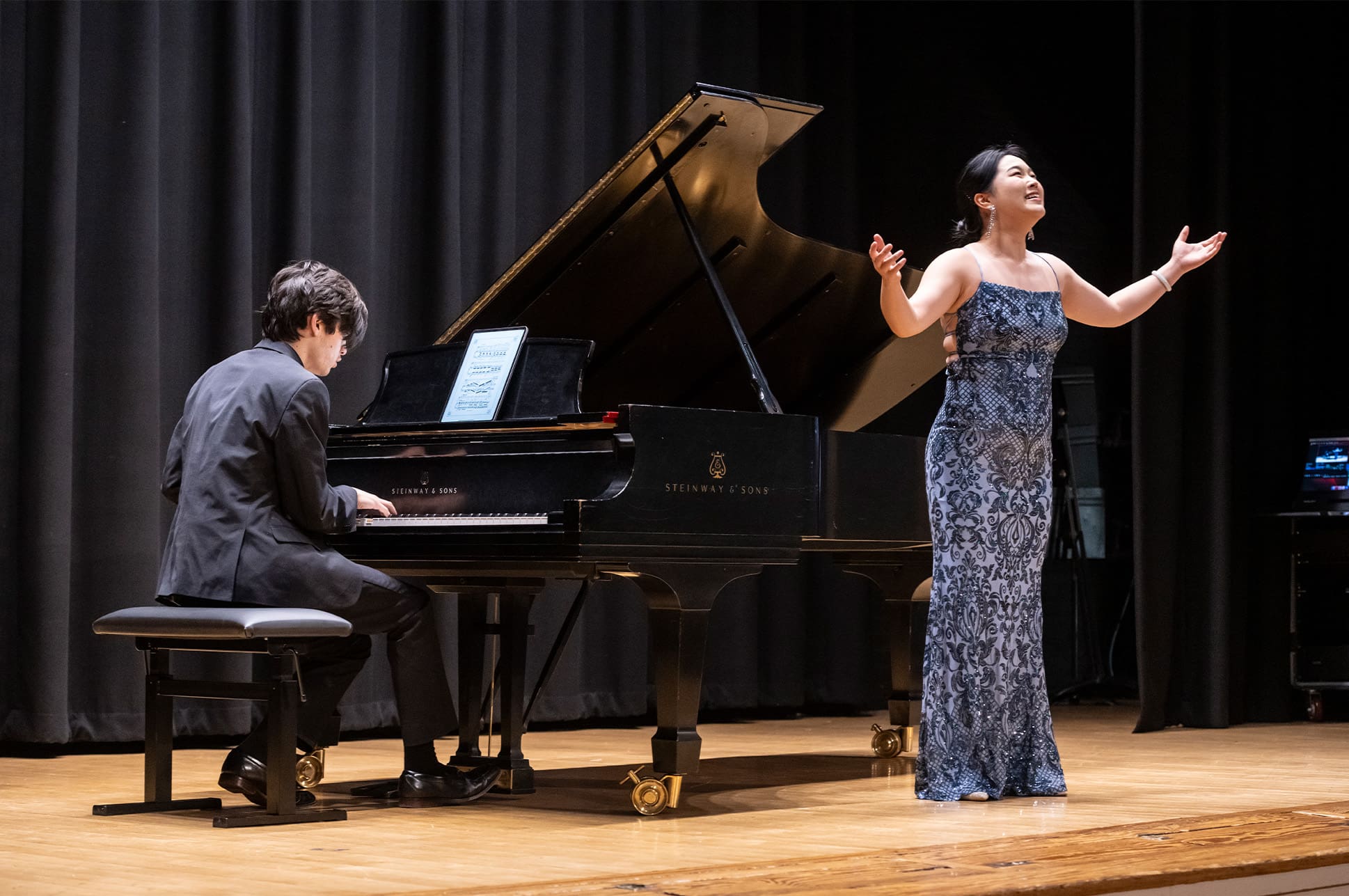 A vocal performance student performs during a Liederabend concert