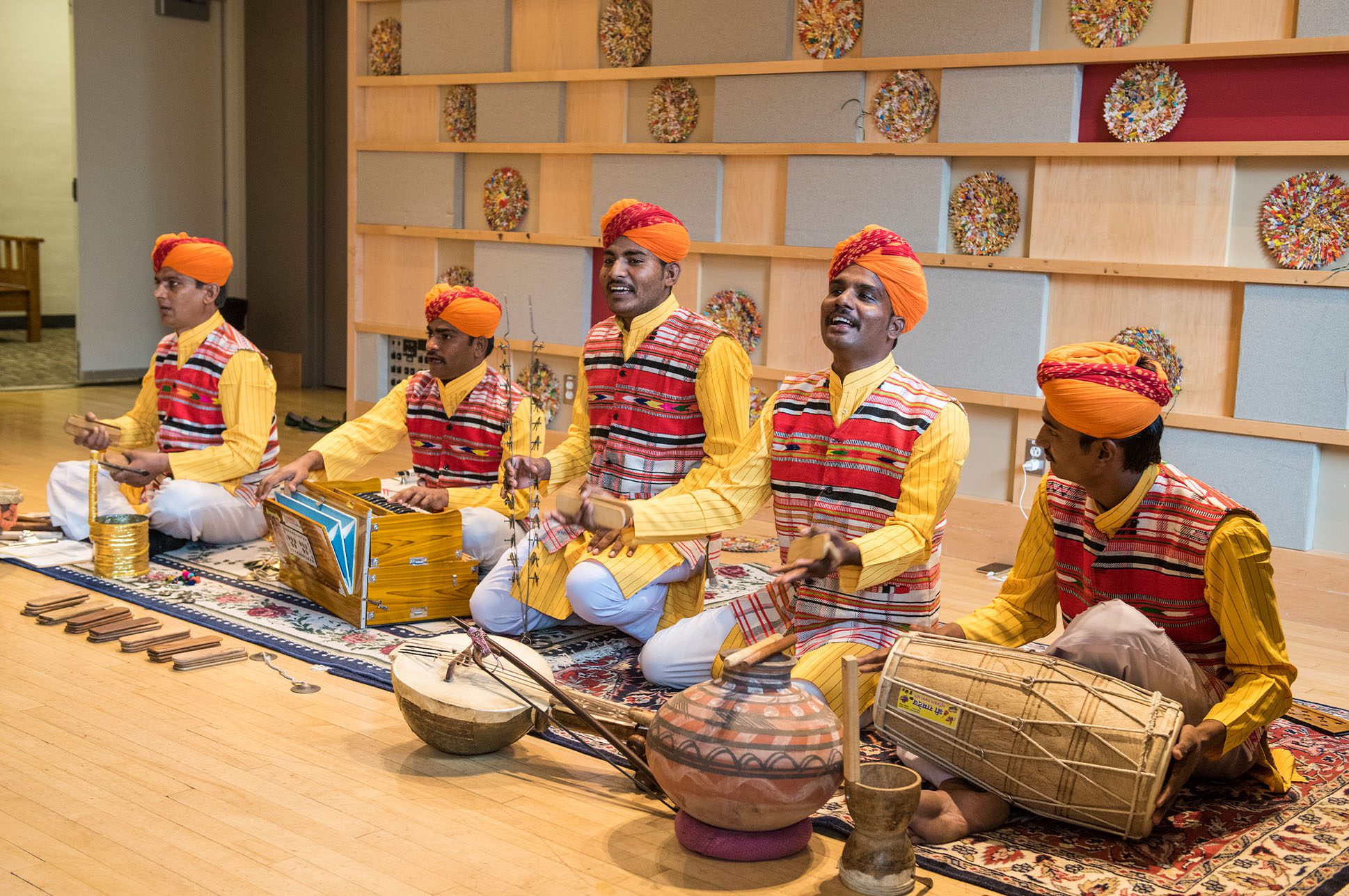 Group of people playing traditional instruments.