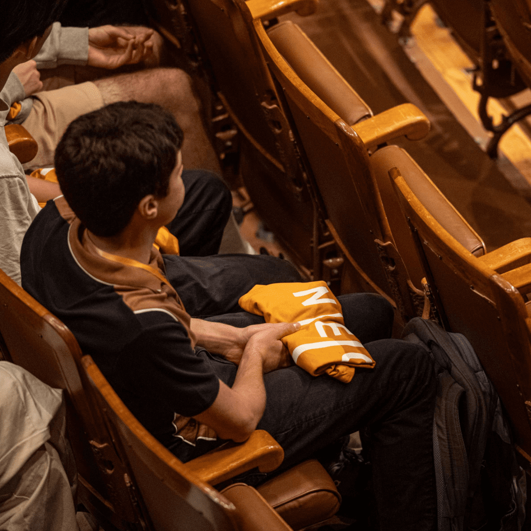 Student with NEC Shirt