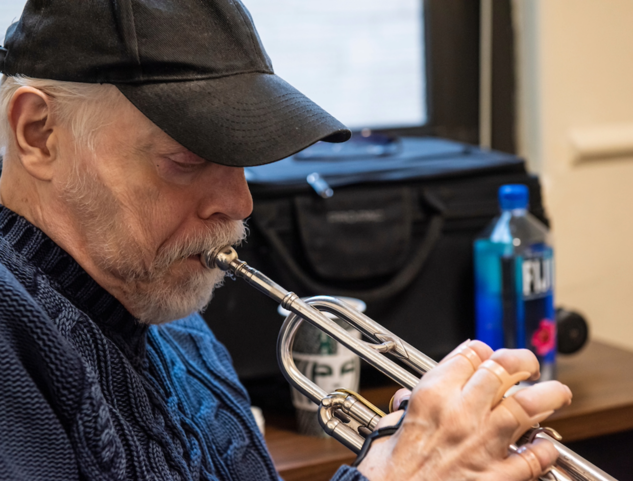 John McNeil playing the trumpet.