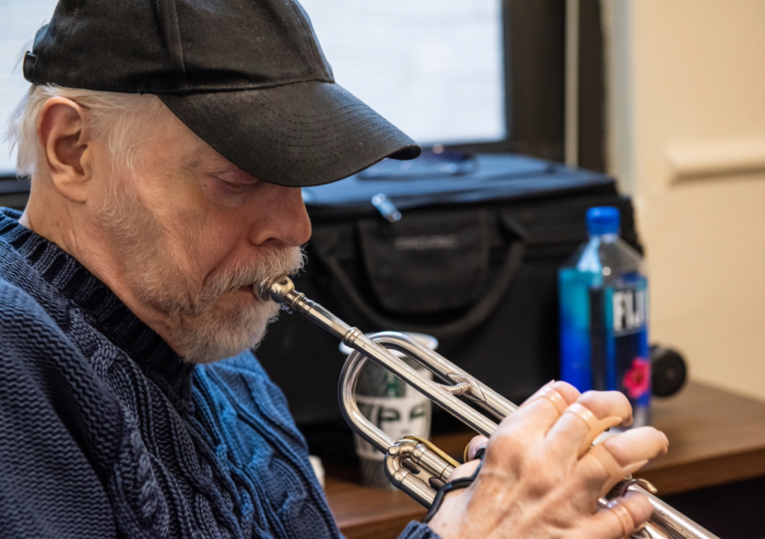 John McNeil playing the trumpet.