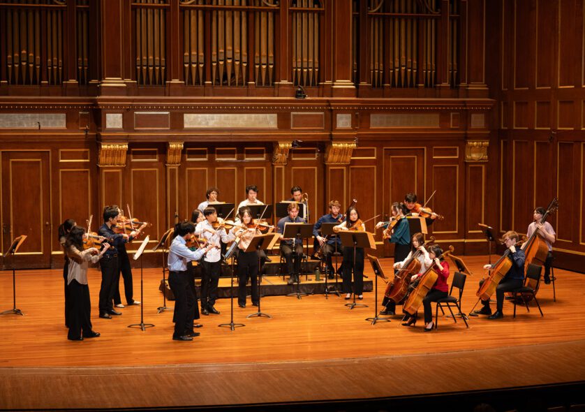 The NEC Chamber Orchestra performing the works of Ives, Seeger, and Haydn in Jordan Hall.