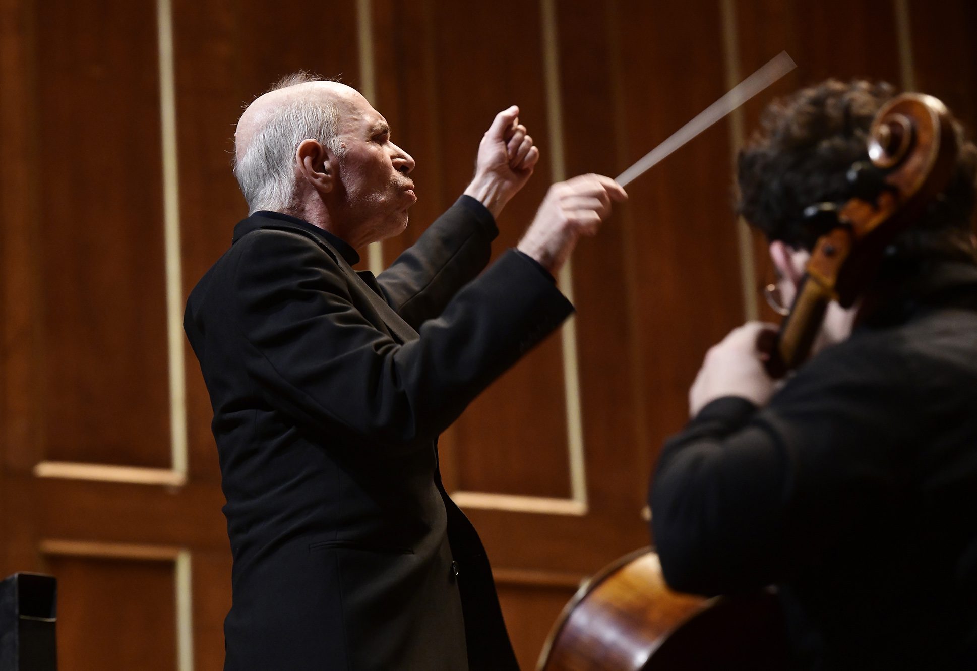 Associate Director of Orchestras David Loebel conducting the NEC Symphony Orchestra for their performance of works from Ives and Dvořák.