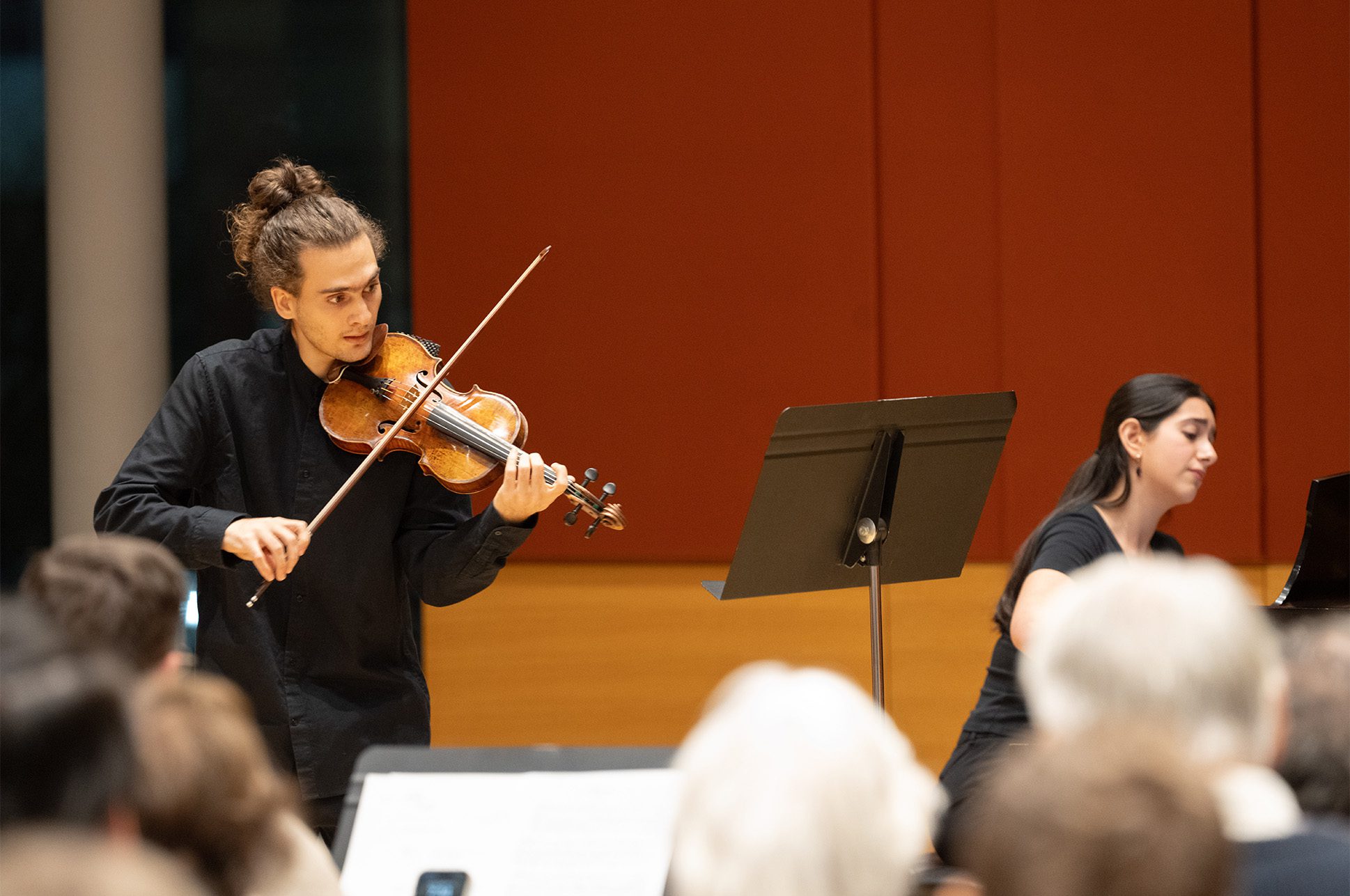 Student playing a violin.