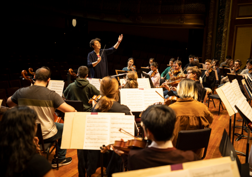 Mei-Ann Chen conducts the NEC Philharmonia in December 2022. Tom Kates Photography