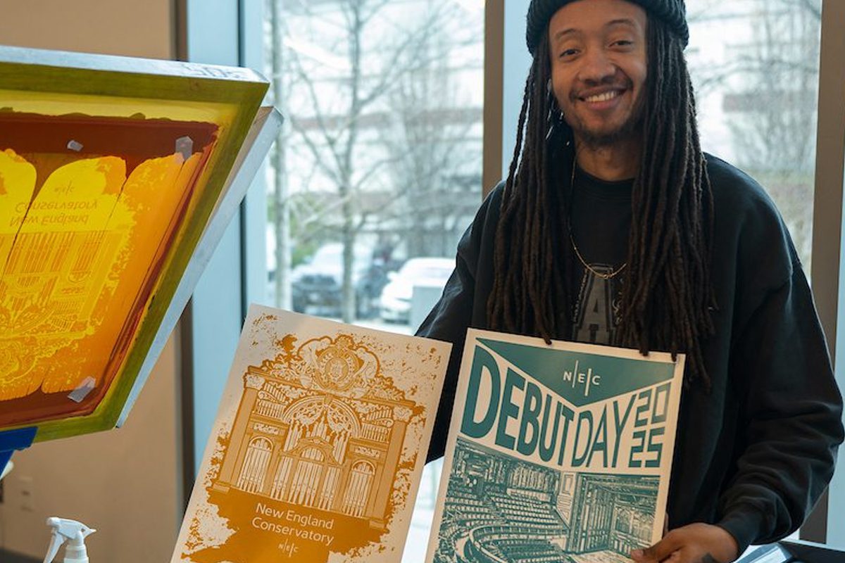 Custom Debut Day posters are screen-printed for guests in the SLPC. 