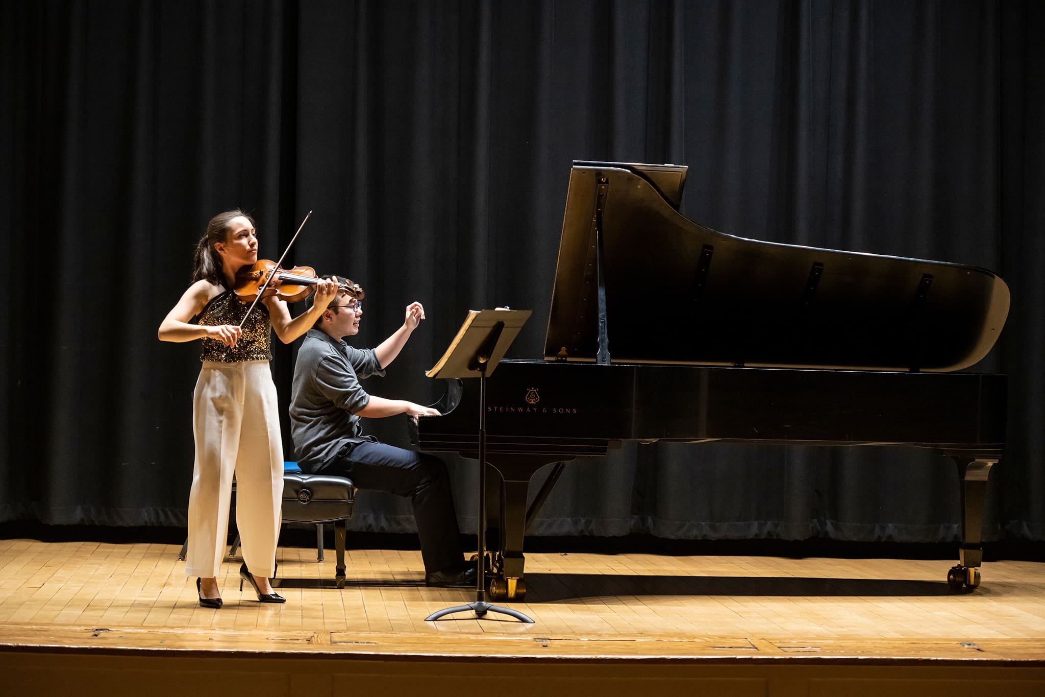 Chamber-Music-For-Pianists-Horizontal A violinist and a pianist performing on stage in Williams Hall.