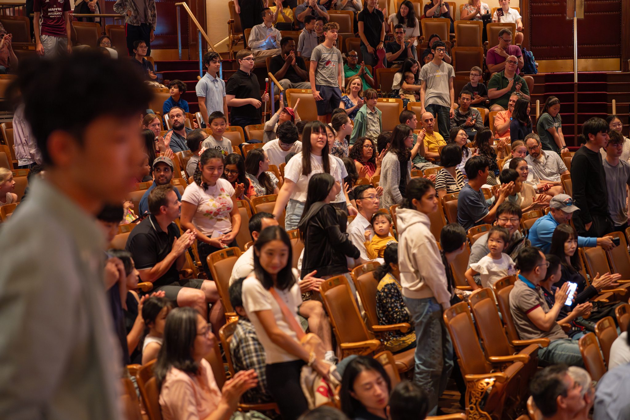 Students and families gather in Jordan Hall at the start of the day.