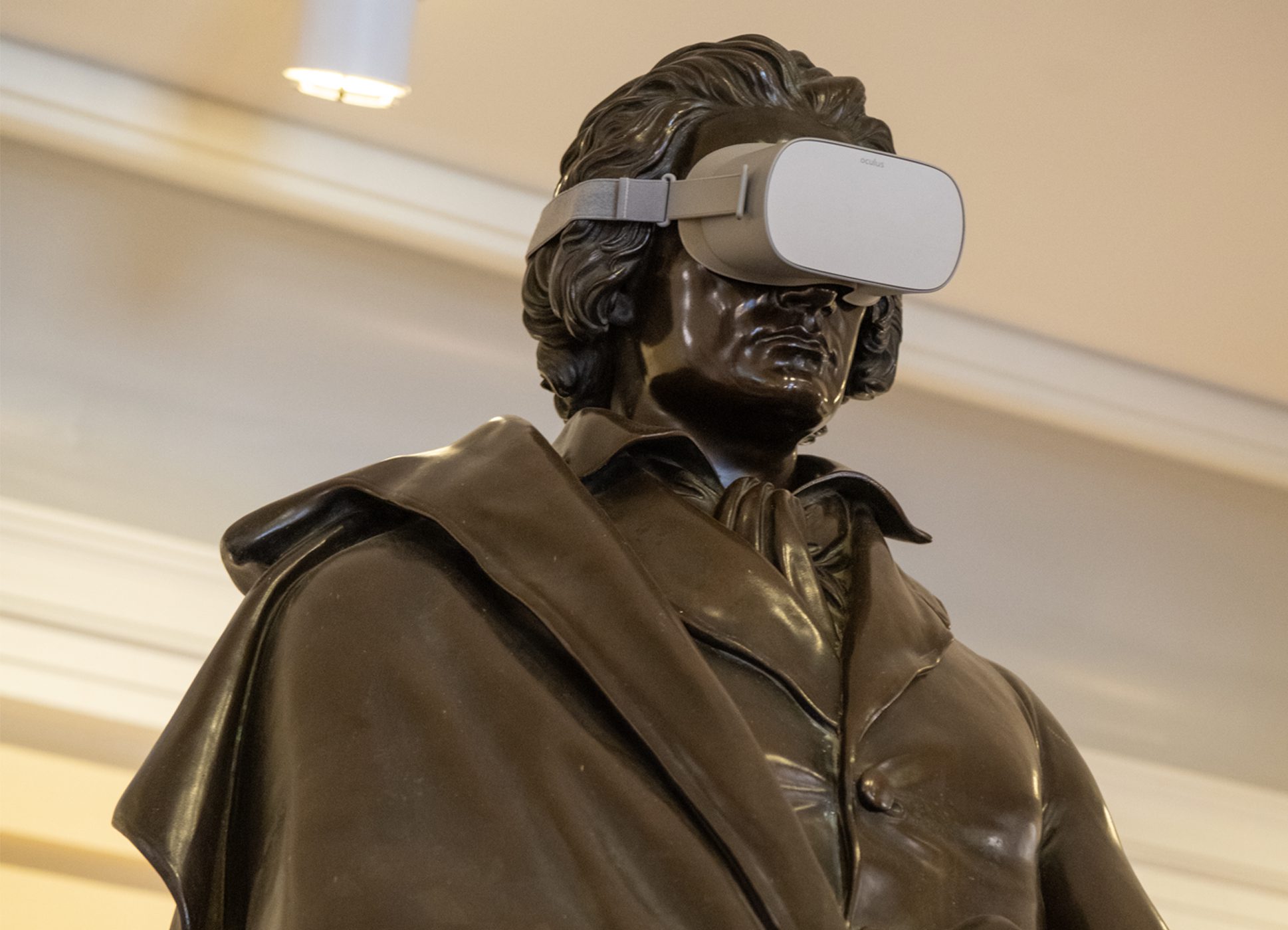 Statue of Beethoven with VR goggles on.