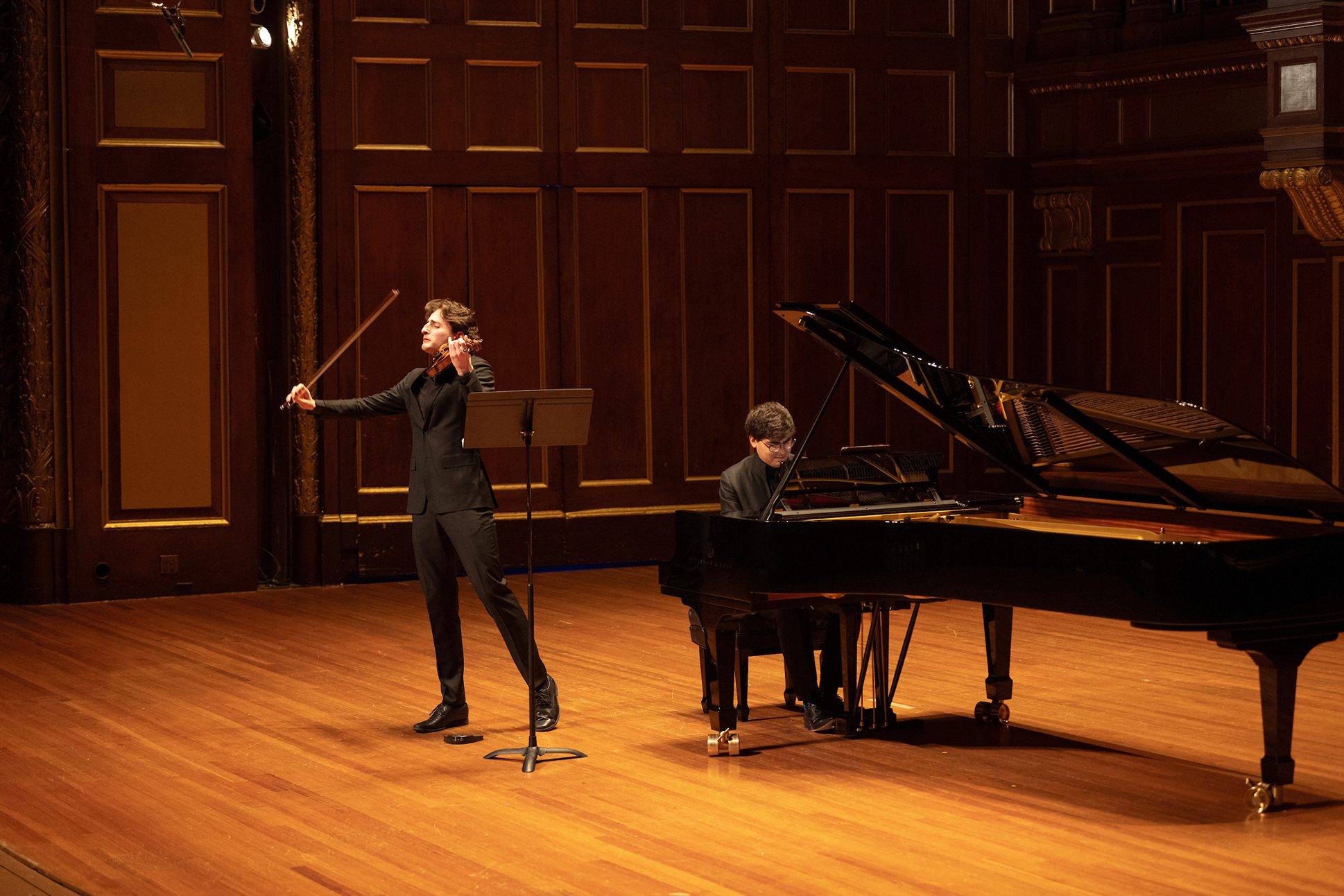 Violinist Joshua Brown and pianist Evren Ozel perform together on the Jordan Hall stage. Violinist Joshua Brown and pianist Evren Ozel perform together on the Jordan Hall stage.