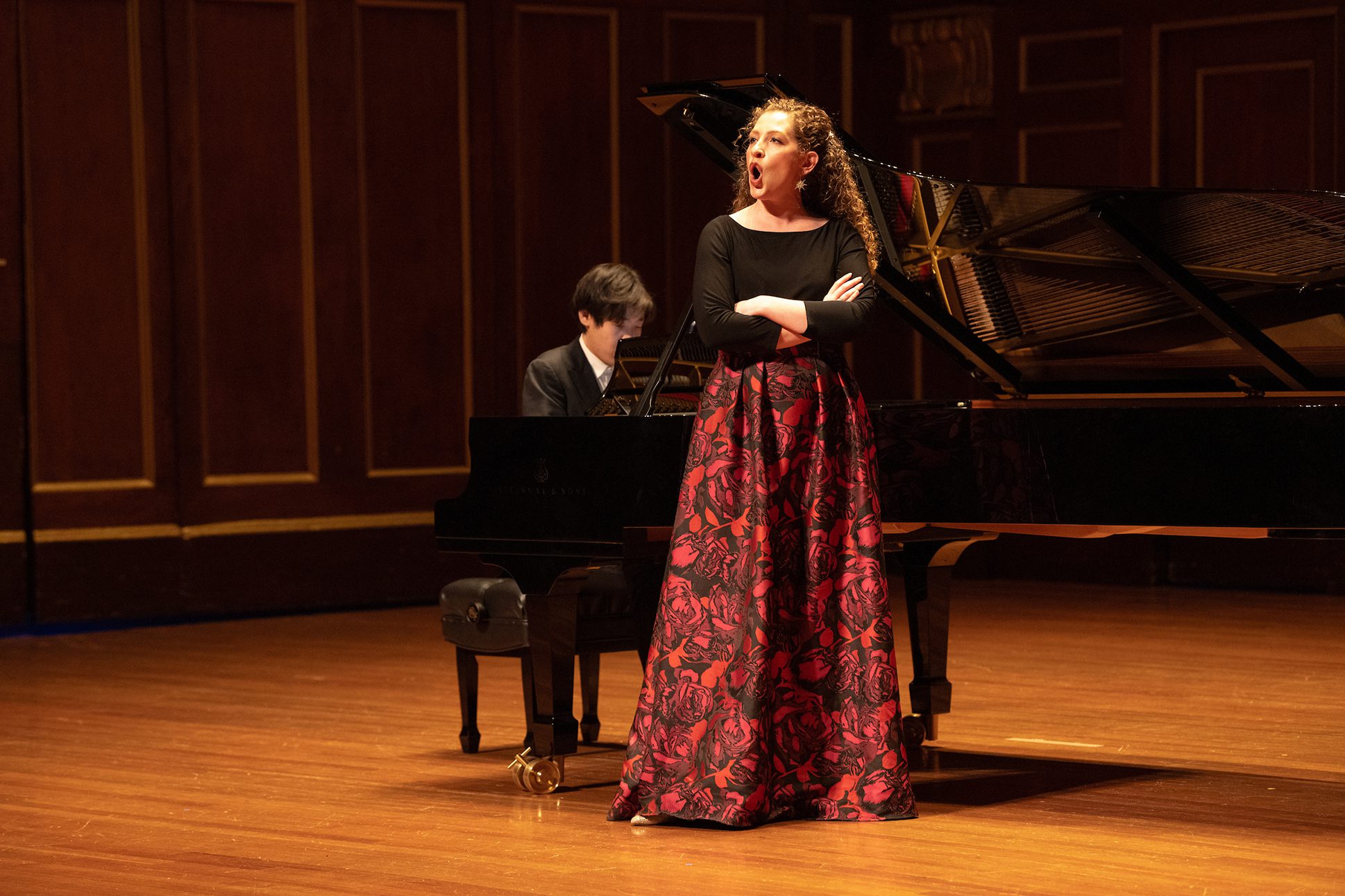 Soprano Josie Larsen and pianist Yutong Sun performing together on the Jordan Hall stage.