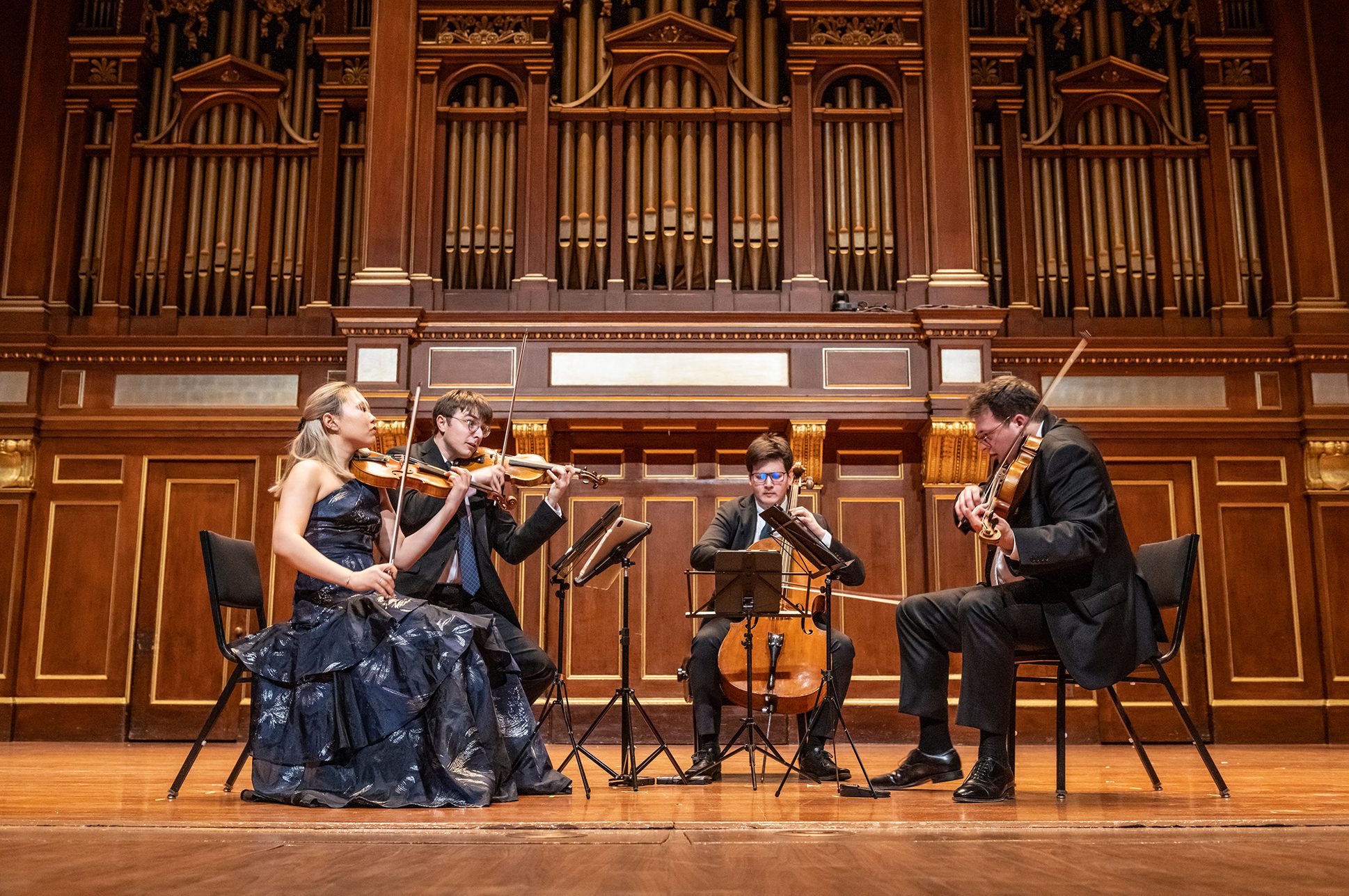 Professional Programs-Balourdet Balourdet Quartet performing on stage.