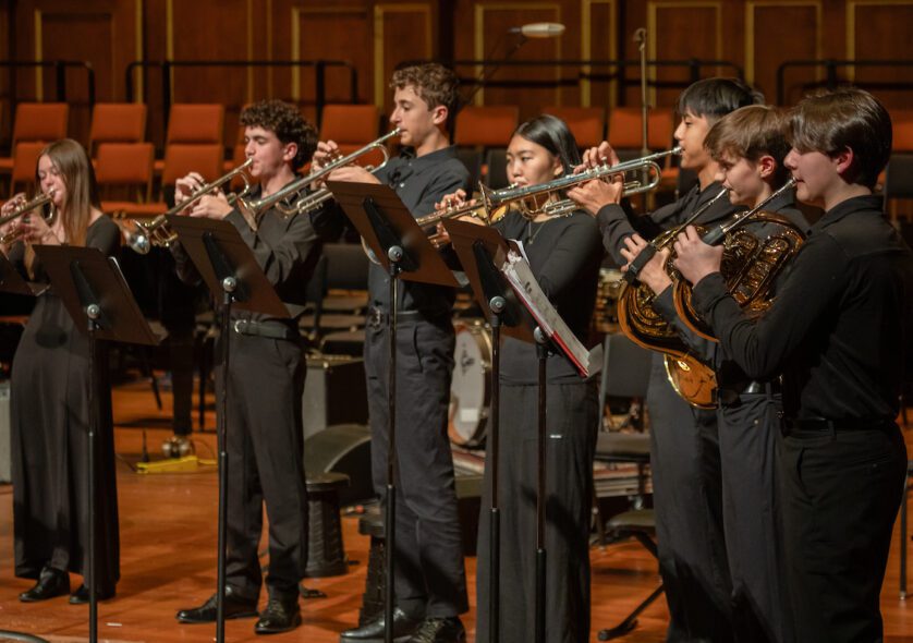 Brass players and percussionists from the Senior Massachusetts Youth Ensemble perform the premiere of Ruhan Iyer's 