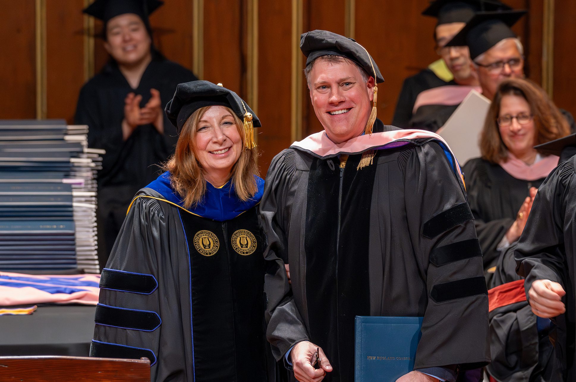 NEC President Andrea Kalyn and BSO CEO Chad Smith at 2025 NEC Commencement.