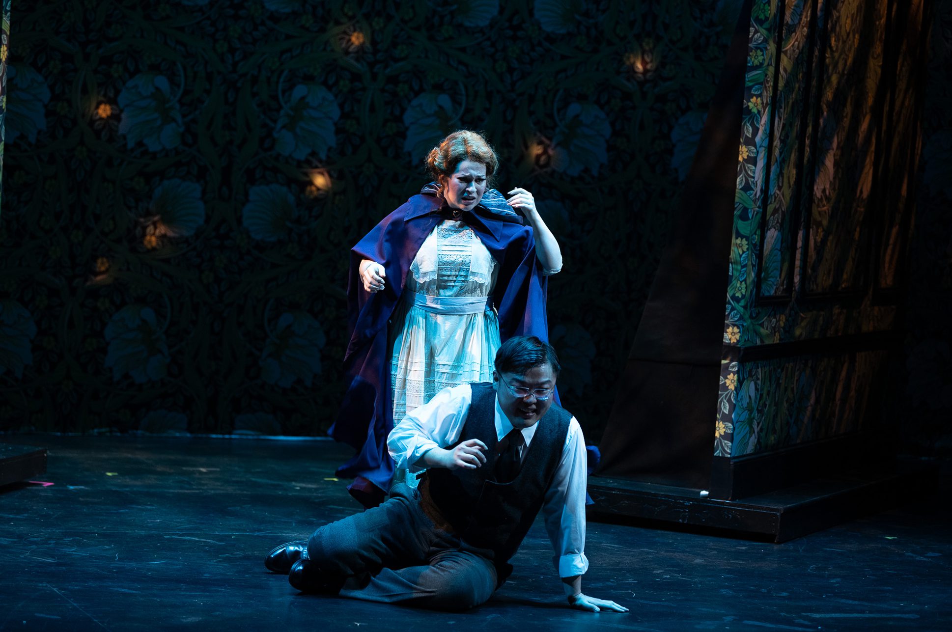 Two opera singers on stage.