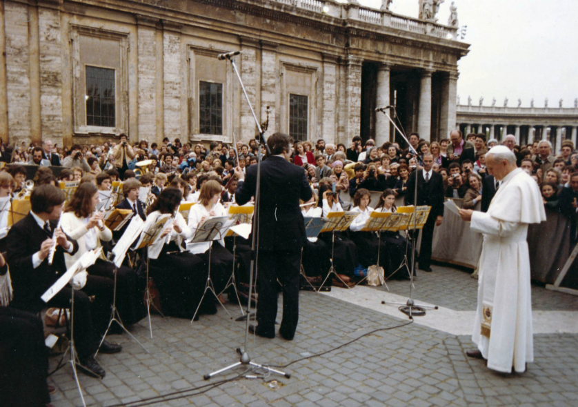 The Massachusetts Youth Wind Ensemble (MYWE) performing for Pope John Paul II at the Vatican, during their 1981 tour of Italy. Photo by Arturo Mari.
