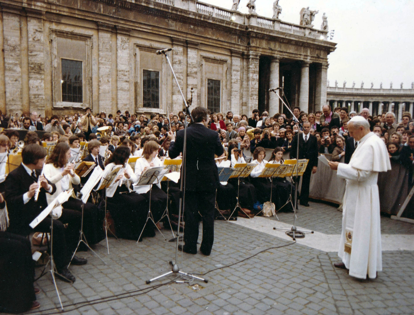 The Massachusetts Youth Wind Ensemble (MYWE) performing for Pope John Paul II at the Vatican, during their 1981 tour of Italy. Photo by Arturo Mari.