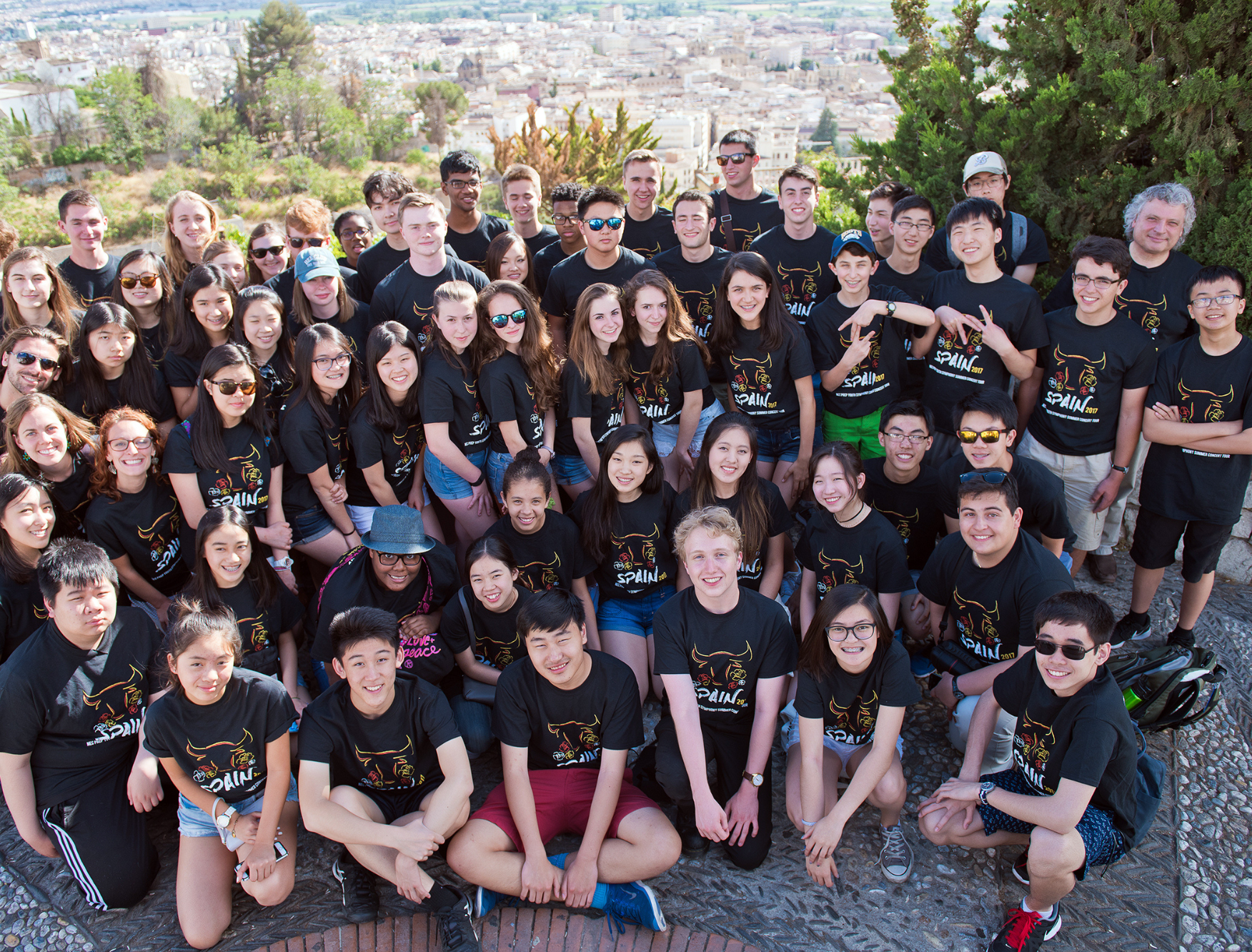Ensemble photo of the NEC Youth Symphony Orchestra (YSO) in Granada, one stop on their tour of Spain, June 2017. Photo by Andrew Hurlbut.