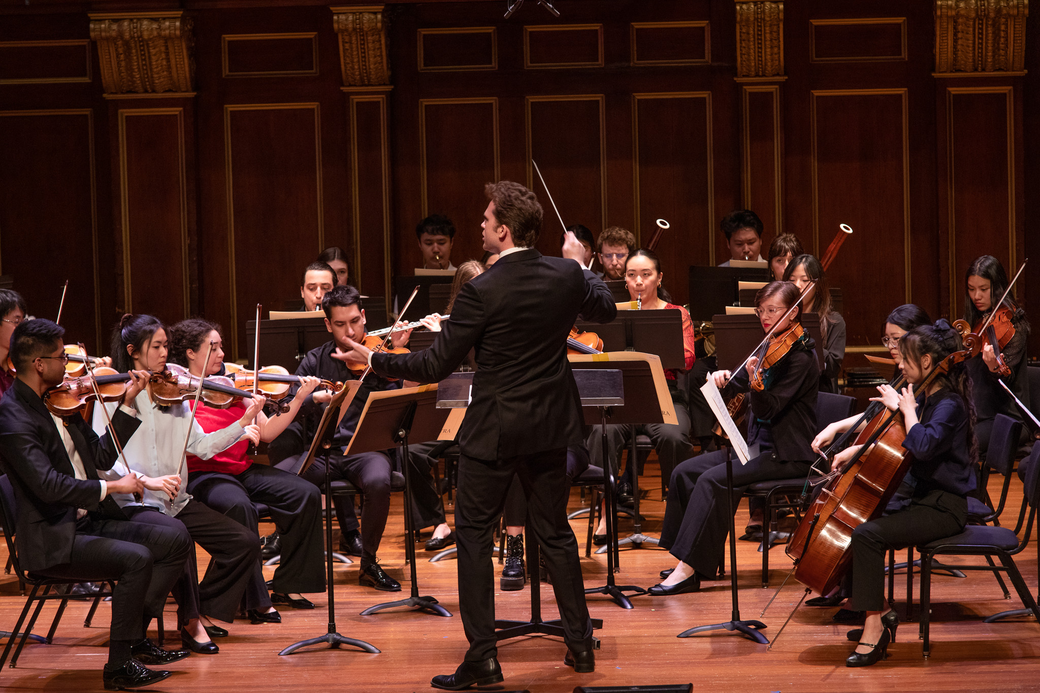 Clancy Ellis '26 GD leads a performance of the Overture to Mozart's "The Marriage of Figaro."