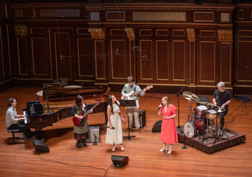 Graduating students perform an arrangement by Lucy Geller '26 MM of 