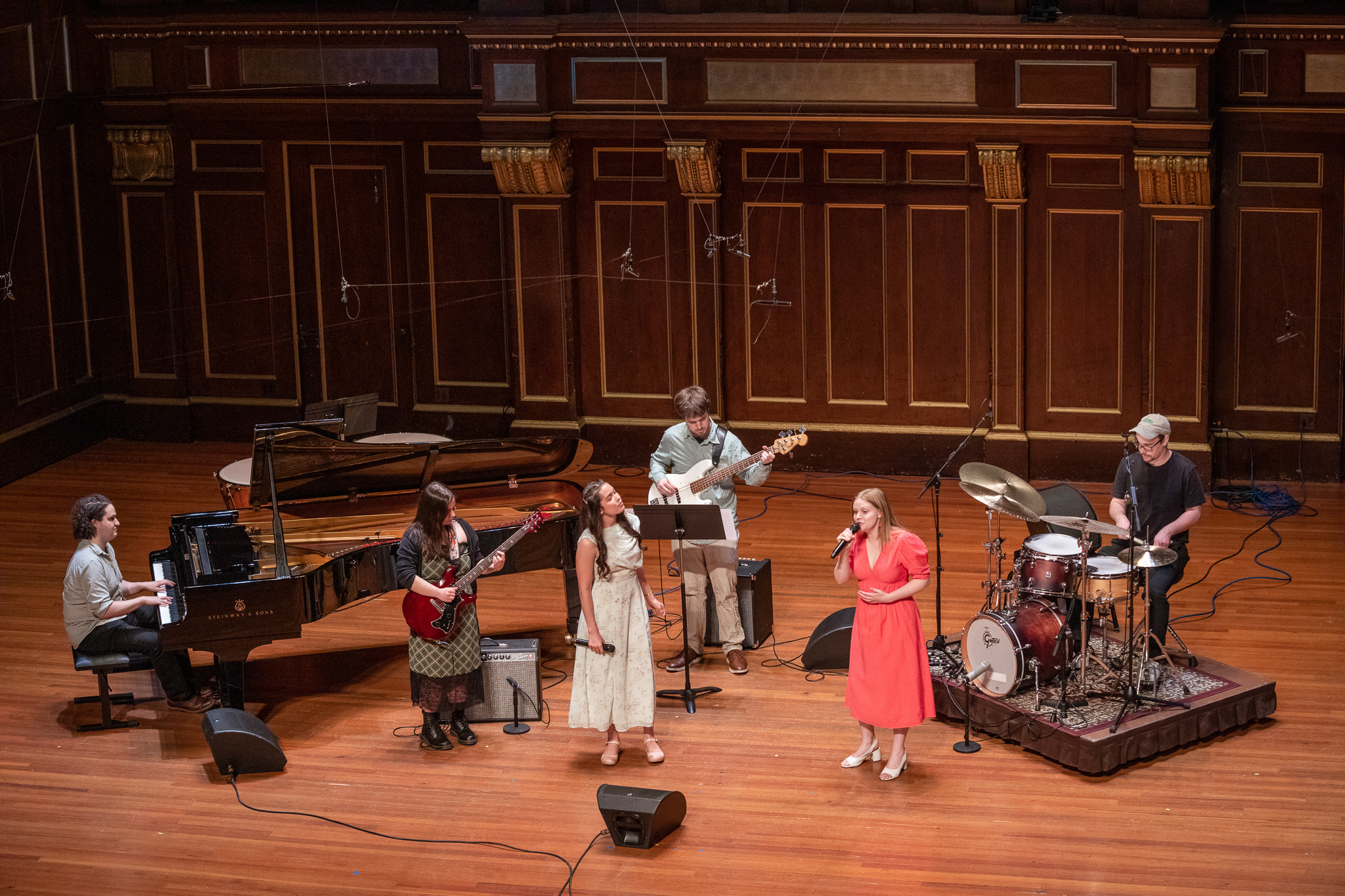 Graduating students perform an arrangement by Lucy Geller '26 MM of "For Good" from Stephen Schwartz's "Wicked."
