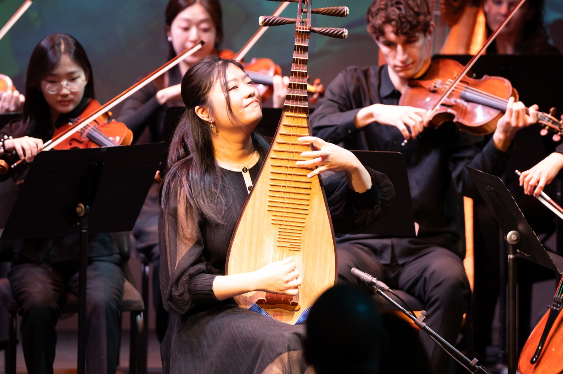 Gala_ScholarshipSupport Musician playing the pipa on stage at the NEC Scholarship Gala.