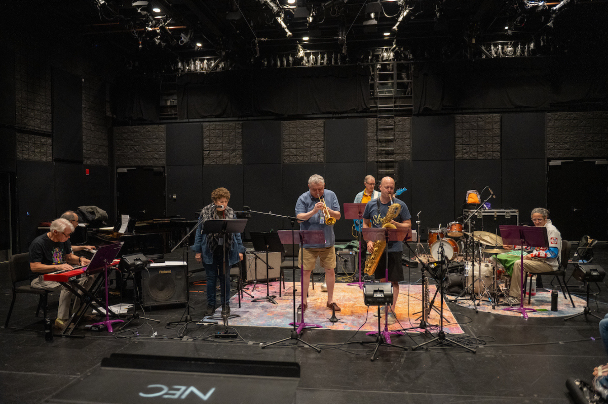 A group of adult musicians playing jazz music. 
