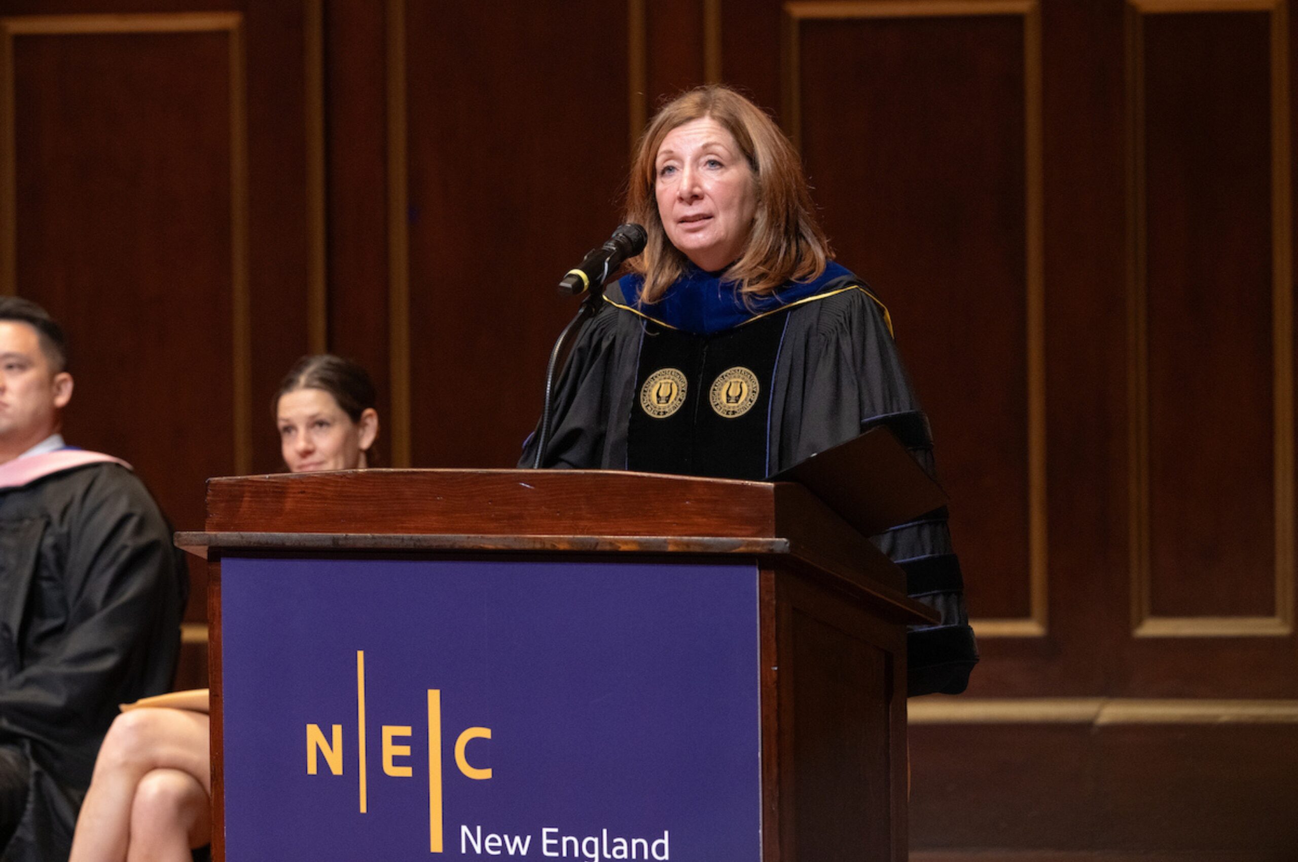 NEC President Andrea Kalyn speaks to students, faculty, and staff during Convocation.
